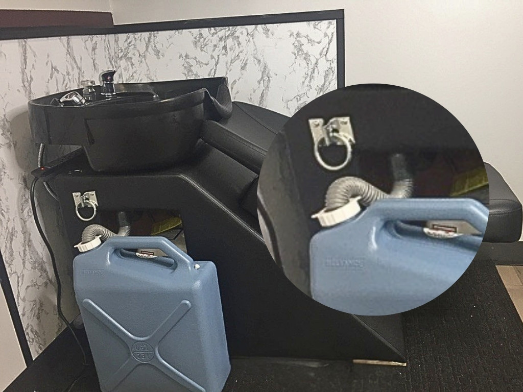 Portable shampoo bowl cabinet closed — everything hidden inside